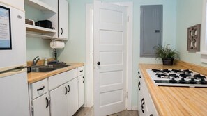 Fridge, microwave, stovetop, coffee/tea maker