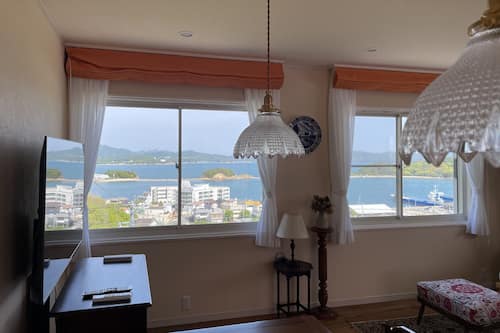 201 Sachi, Non Smoking | Living area | Flat-screen TV