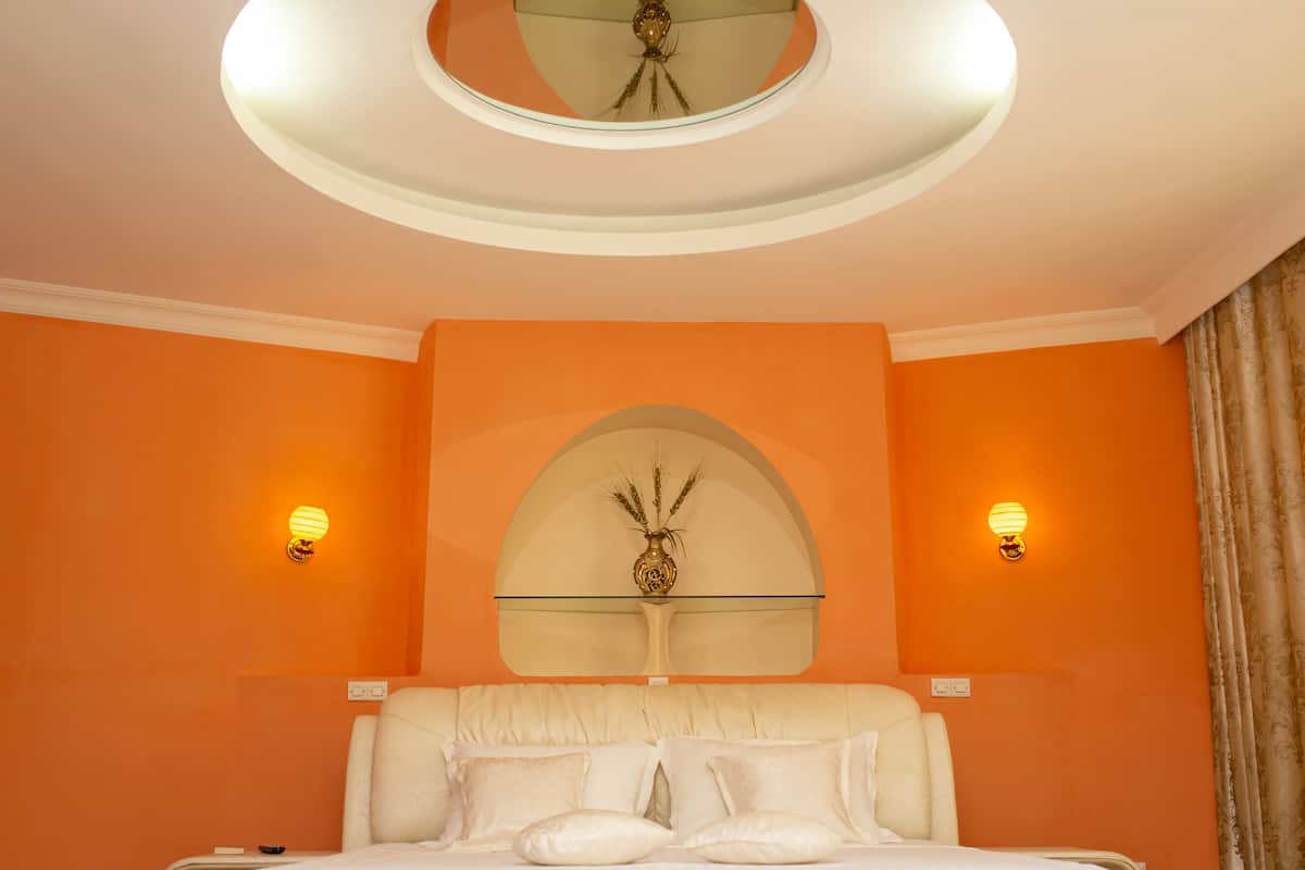 Superior Suite, Garden View | 1 bedroom, in-room safe, iron/ironing board, free WiFi