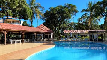 Outdoor pool, open 6:00 AM to 10:00 PM, pool umbrellas, pool loungers