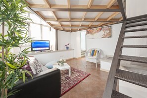 Apartment, Mehrere Betten | Wohnzimmer