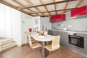 Apartment, Multiple Beds | Private kitchen | Fridge, microwave, oven, stovetop - Inviting 3-bed Apartment in Roma 4mins to Colosseo (Rome)