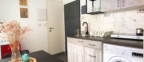 Microwave, stovetop, cookware/dishes/utensils