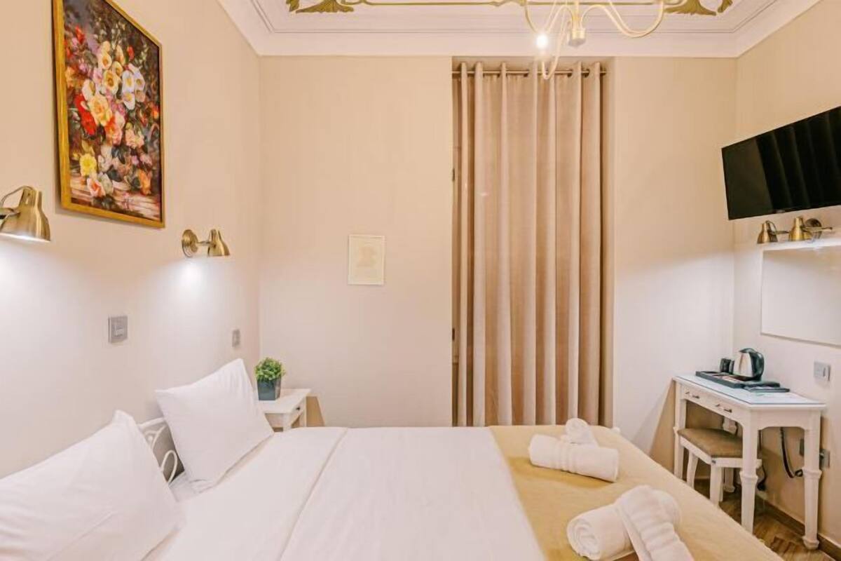 Memory-foam beds, minibar, desk, laptop workspace