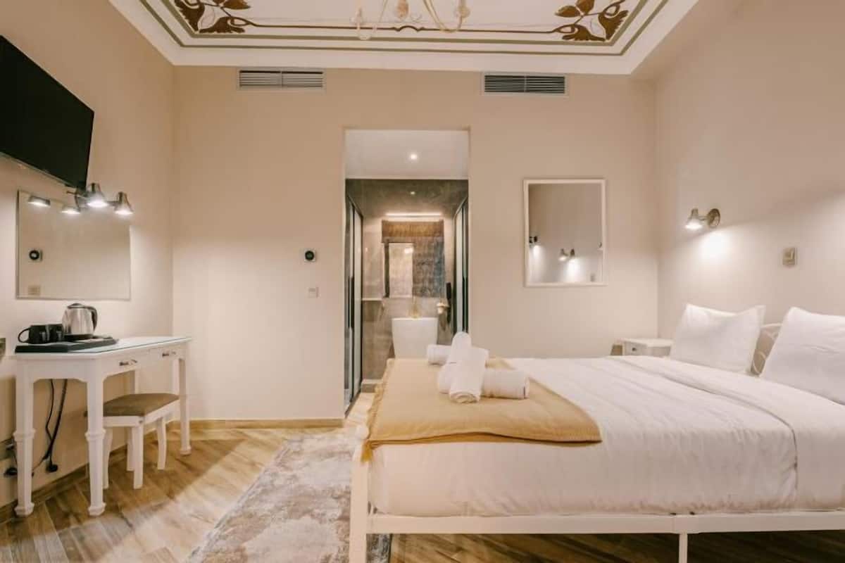 Memory-foam beds, minibar, desk, laptop workspace