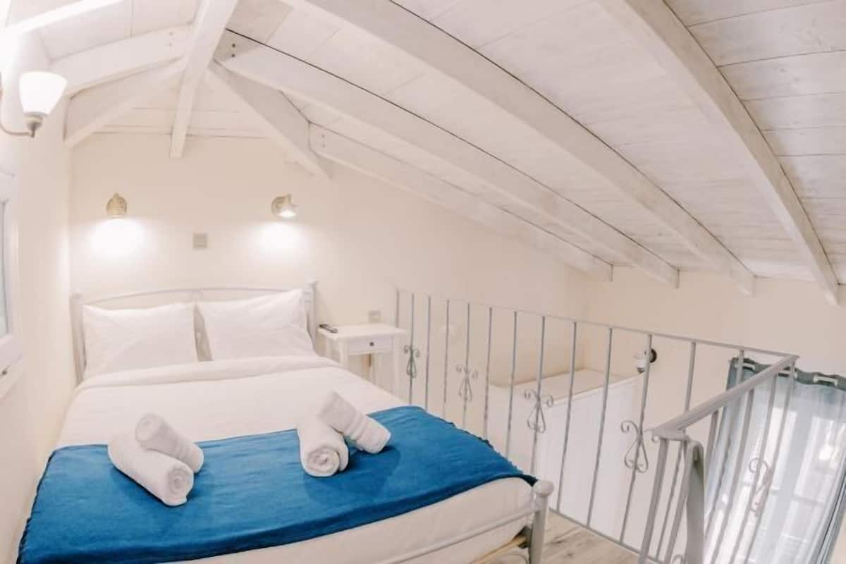 Memory-foam beds, minibar, desk, laptop workspace