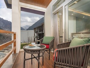 Premium Delight | Terrace/patio - Snowland Resort & Spa - Riverfront (Gund)