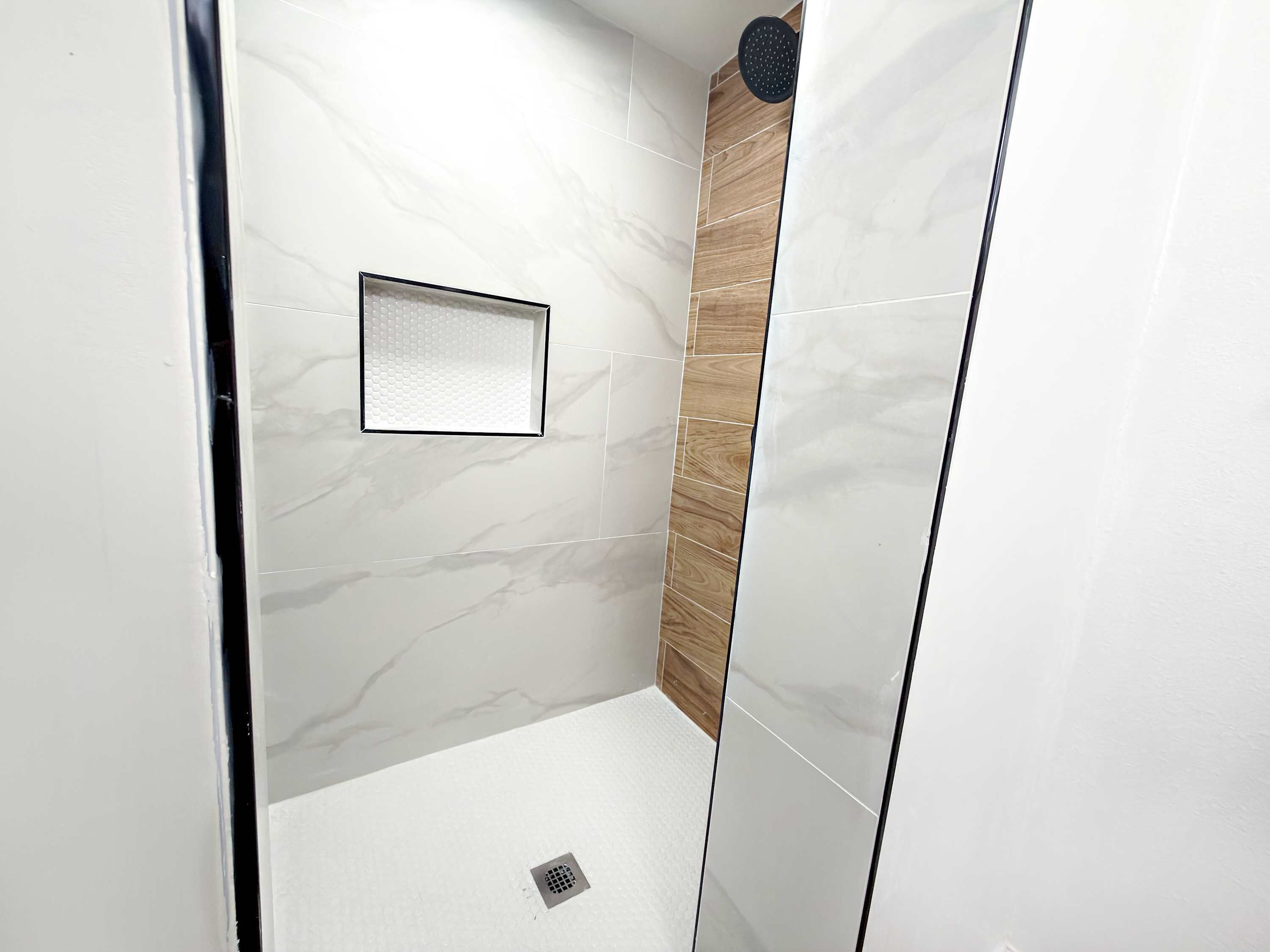 Bathtub, hair dryer, towels