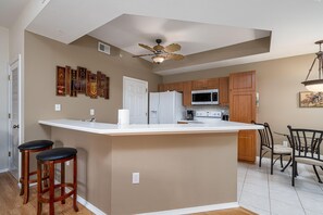 Condo, 3 Bedrooms | Private kitchen - The Enclave at College Point # 22-08 - 9055 Colby Dr Unit Buildi by Coastal Vacation Properties (Fort Myers)