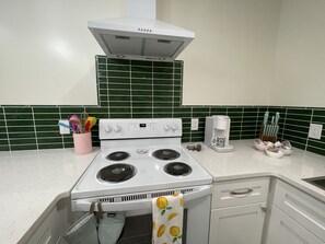 Fridge, microwave, oven, stovetop - Eccentric Privy-Sleeps6. 2nd floor & outdoor deck (Pikeville)