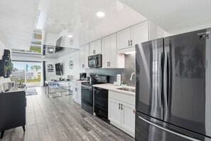 Fridge, microwave, oven, stovetop - The Summit 132-Ground Level Beachfront Condo (Panama City)