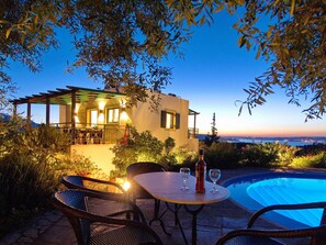 Relax by the pool or dine al fresco in the villa's serene outdoor space.