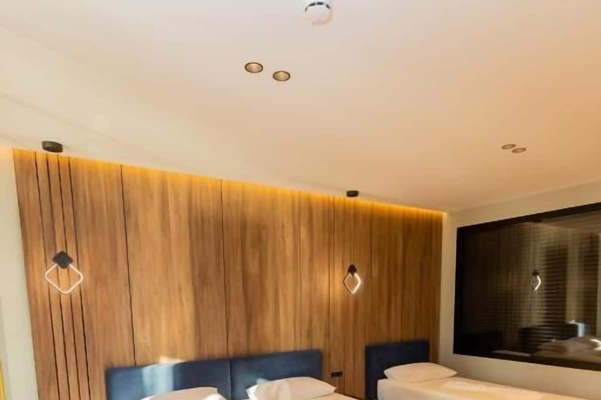 Family Room, Sea View | Minibar, in-room safe, soundproofing, free WiFi