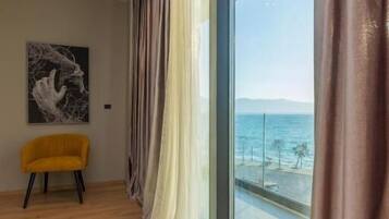Family Room, Sea View | Minibar, in-room safe, soundproofing, free WiFi