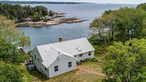 Exterior - Experience coastal charm at Merwick Cottage in Georgetown, ME, with 3 bedrooms and waterfront views. (Georgetown)