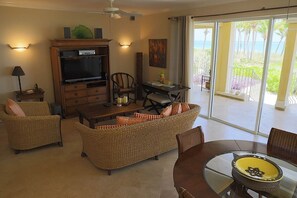Grand Condo | Living area | 43-inch flat-screen TV with cable channels, TV - Villa Renaissance Grace Bay (Providenciales)