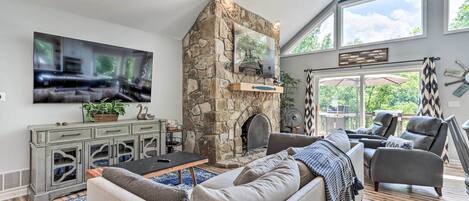 TV, fireplace, books