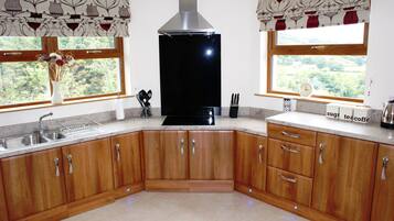 Cottage, 4 Bedrooms (Glendun) | Private kitchen | Fridge, microwave, electric kettle, high chair