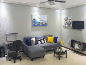 Smart TV - Island Odyssey - where comfort meets experience. (Kingston)