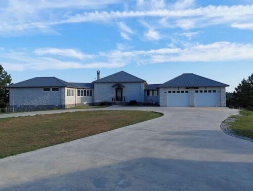 Private RV covered site with attached living area.