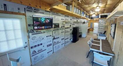 Private RV covered site with attached living area.