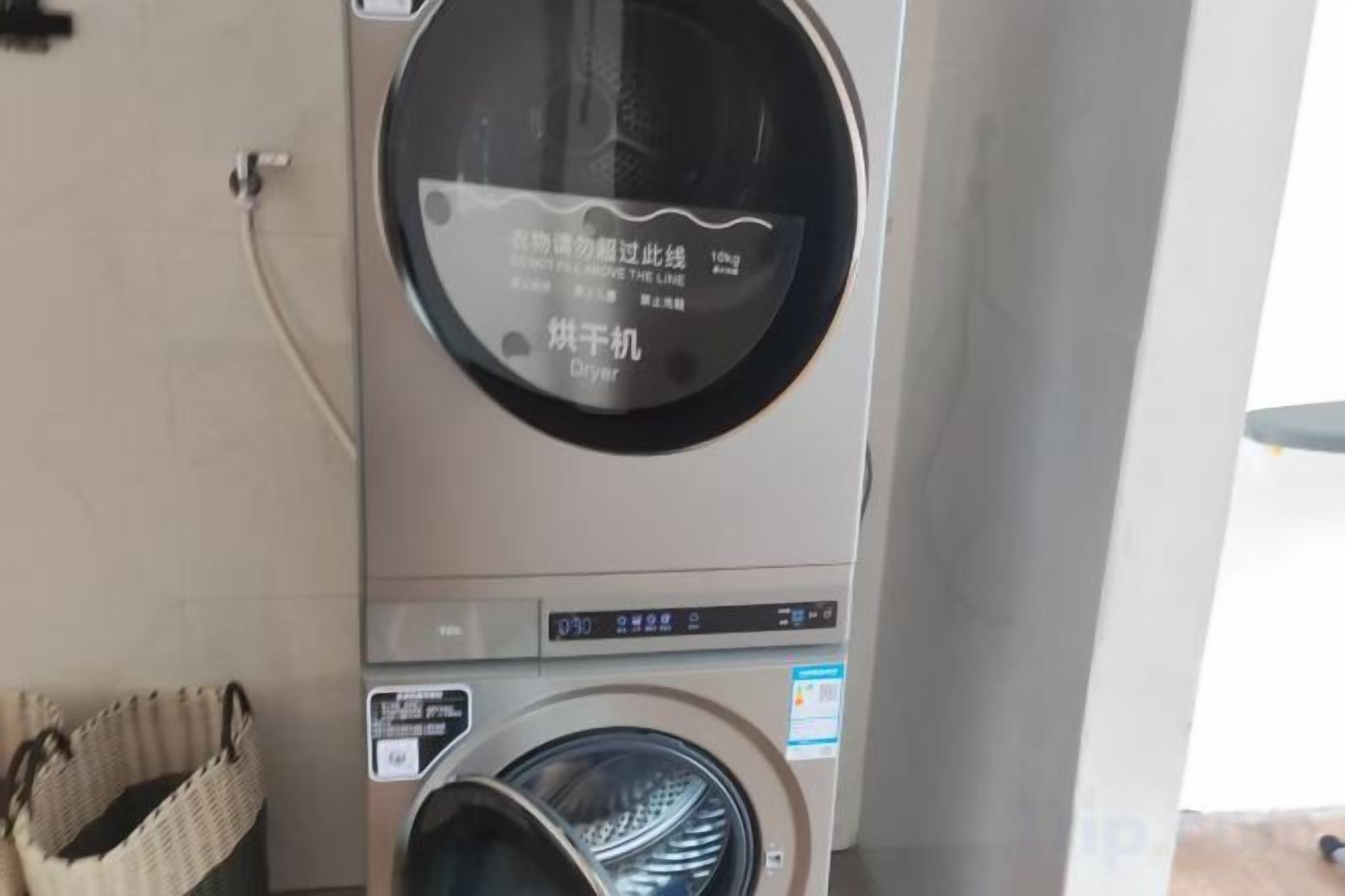 A laundry machine with a digital display and a control panel.