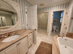 Bathtub, hair dryer, towels, soap