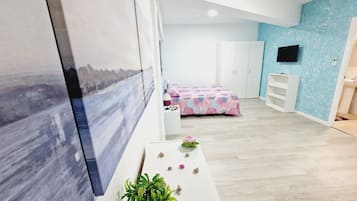 2 slaapkamers, een strijkplank/strijkijzer, gratis internet, beddengoed
