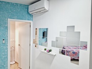 2 habitaciones, tabla de planchar con plancha y internet gratis