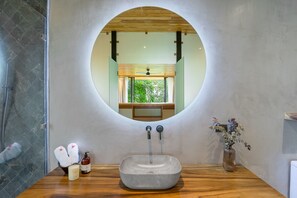 Bathtub, hair dryer, towels, soap