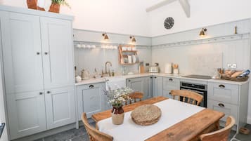 Fridge, electric kettle, toaster, cookware/dishes/utensils