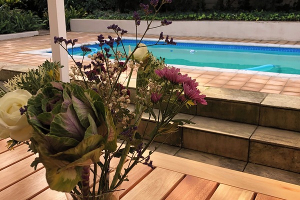 Portch with heated swimming pool and table