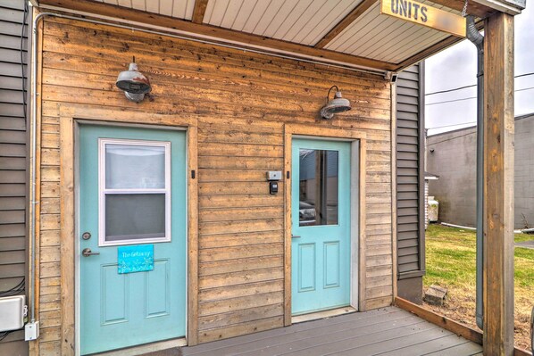 A wooden building with two doors, each with a small window and a sign reading "The Way." - Immaculate Long Beach Apt w/ Gorgeous Kitchen (Long Beach)
