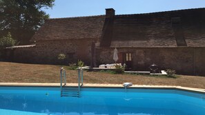 Outdoor pool, a heated pool - Beautiful luxury restored gîte with private solar heated pool. (St. Paul la Roche)