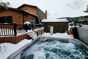 Outdoor spa tub - A private, breath-taking cabin experience you won`t forget! (Sturgis)