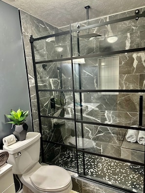 Combined shower/bathtub