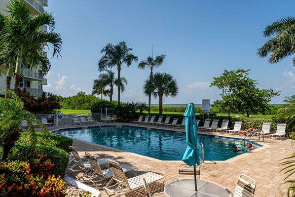 Outdoor pool - Estero Beach and Tennis Club # 302a - 7300 Estero Blvd by Coastal Vacation Properties (Fort Myers Beach)