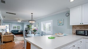Cottage, 3 Bedrooms | Private kitchen - 307 Lazy Way Lazy Limpkin Cottage by Coastal Vacation Properties (Fort Myers Beach)