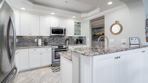 Condo, 3 Bedrooms | Private kitchen - Bella Lago # 444 - 7411 Bella Lago Drive by Coastal Vacation Properties (Fort Myers Beach)