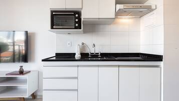 Fridge, microwave, coffee/tea maker, toaster