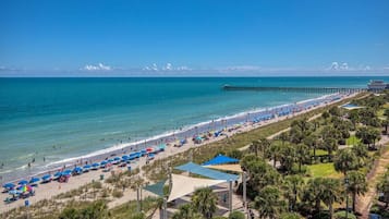 On the beach, sun-loungers