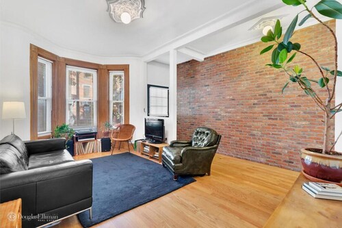 Gorgeous two story private home and garden 1/2 a block from McGolrick Park 