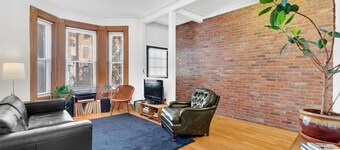 Gorgeous two story private home and garden 1/2 a block from McGolrick Park 