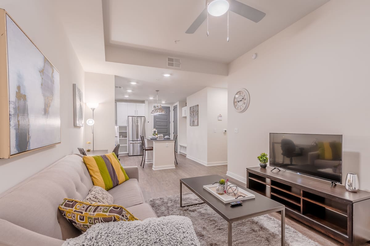 Comfort Apartment | Living area | 55-inch Smart TV with digital channels, TV