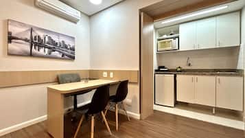 Business Double Room | Living area | Flat-screen TV