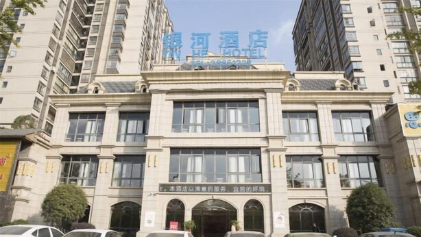 A hotel building with a sign reading "Hotel". - Yin He Hotel (Zunyi)