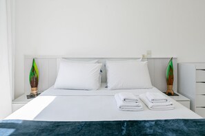 2 habitaciones, tabla de planchar con plancha, internet y ropa de cama 