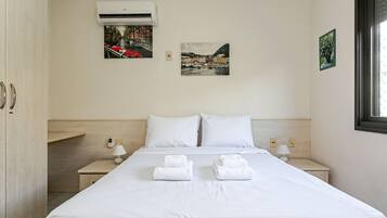 2 quartos, ferros/tábuas de passar roupa, Wi-Fi, roupa de cama