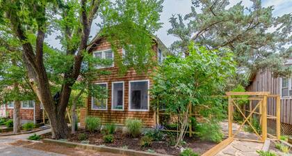 Charming home steps from beach with deck, outdoor shower, grill, & bikes