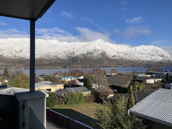 Enjoy breathtaking views of snow-capped mountains and a serene lake from your balcony or terrace.